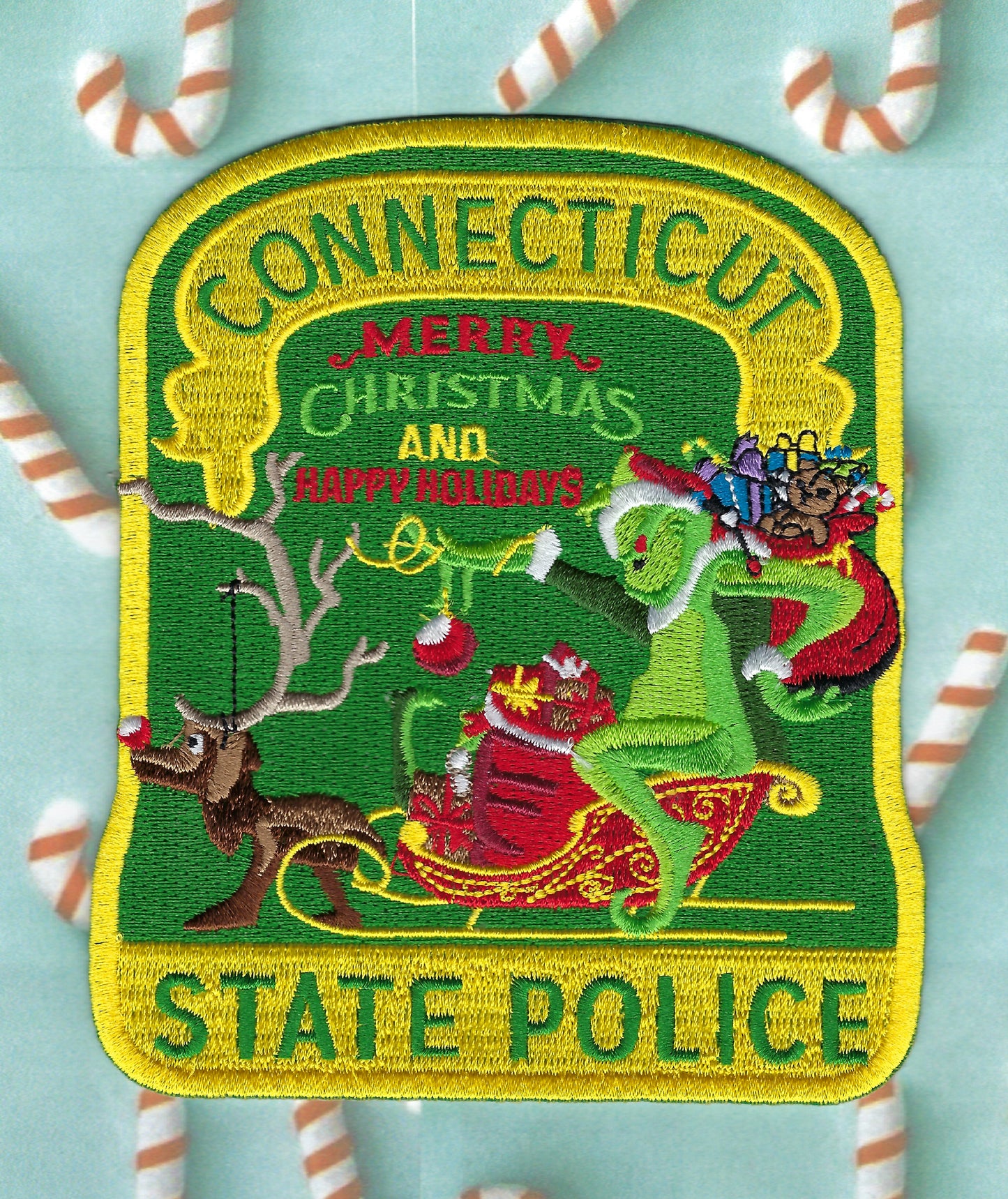 CONNECTICUT STATE POLICE (CTSP) DEPARTMENT MERRY CHRISTMAS 'GRINCH' EMBROIDERED PATCH BY PUBLIC SAFETY COLLECTIBLES.