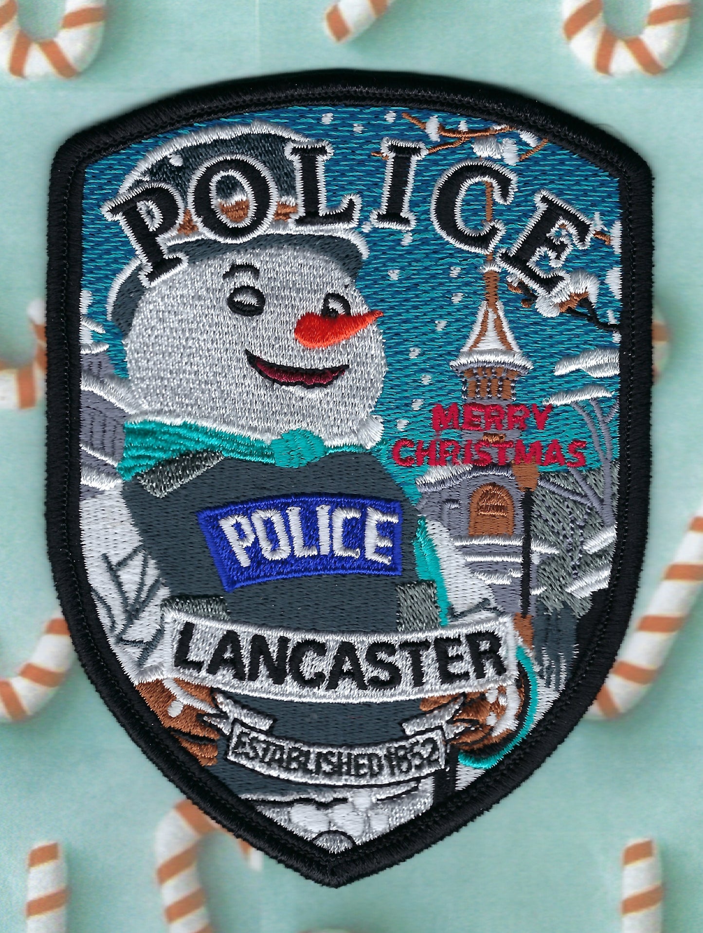 LANCASTER, PENNSYLVANIA POLICE DEPARTMENT MERRY CHRISTMAS EMBROIDERED PATCH BY UNDERDOG PATCH PRODUCTIONS.