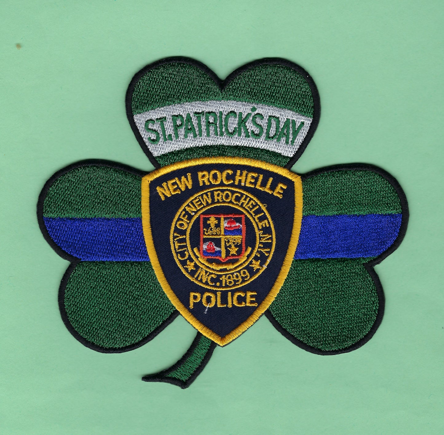 NEW ROCHELLE POLICE DEPARTMENT ( WESTCHESTER COUNTY, NEW YORK ) FIRST EDITION SAINT PATRICK'S DAY EMBROIDERED HOLIDAY PATCH DESIGNED AND PRODUCED FOR US BY UNDERDOG PATCH DESIGNS.