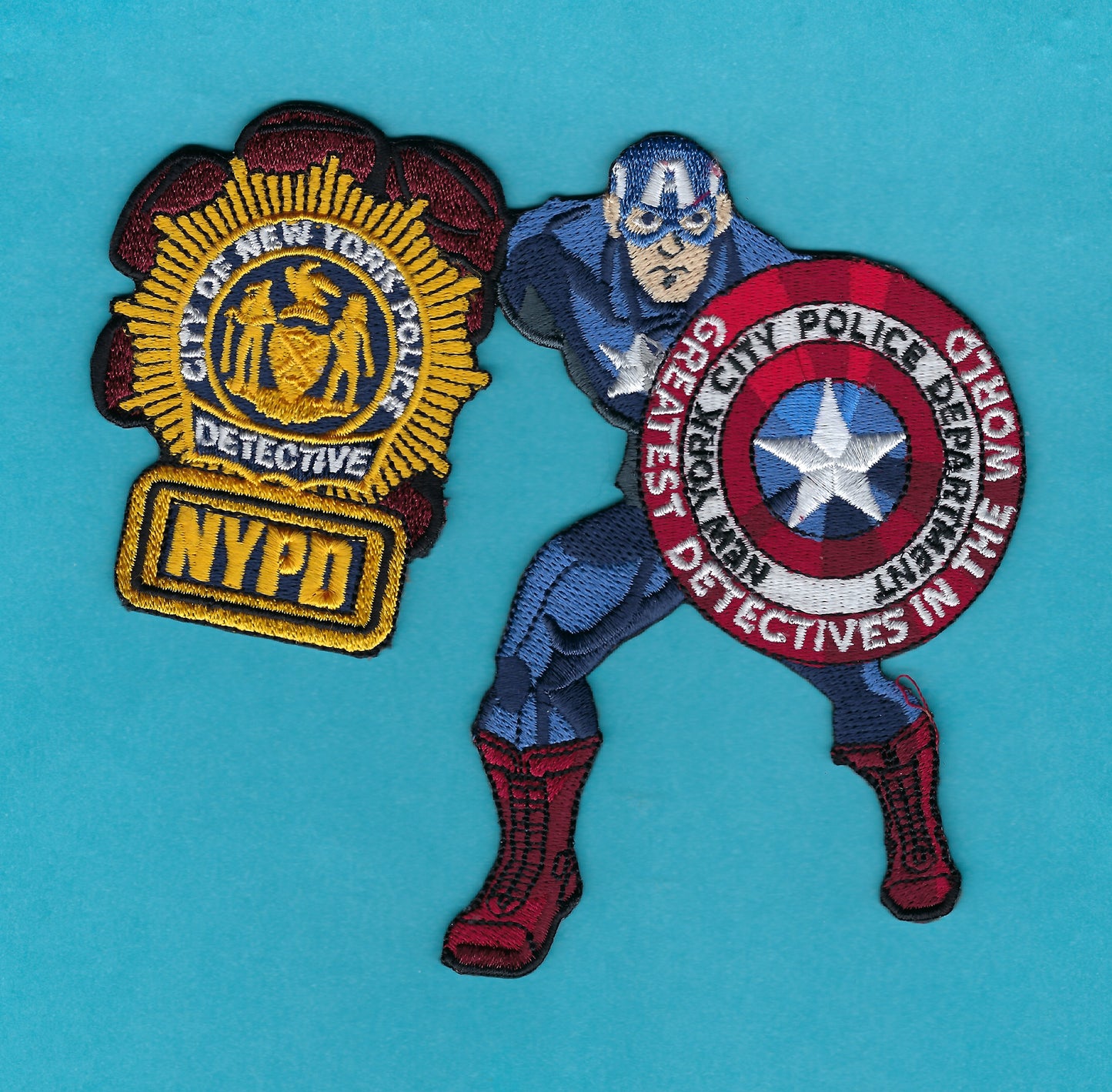 NEW YORK CITY POLICE DEPARTMENT (NYPD) 4.75 INCH 'GREATEST DETECTIVES IN THE WORLD' EMBROIDERED PATCH DESIGNED AND PRODUCED BY UNDERDOG PATCH PRODUCTIONS.