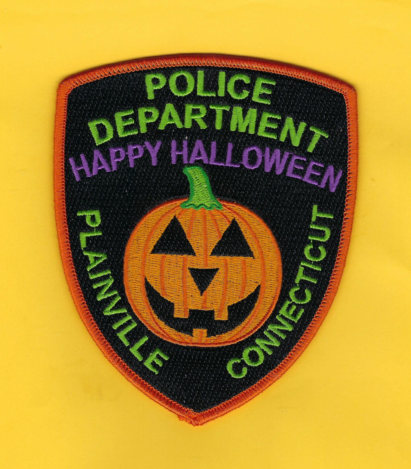 PLAINVILLE, CONNECTICUT POLICE DEPARTMENT 5-INCH EMBROIDERED HALLOWEEN PATCH DESIGNED AND PRODUCED BY GHOST PATCH ENTERPRISES.