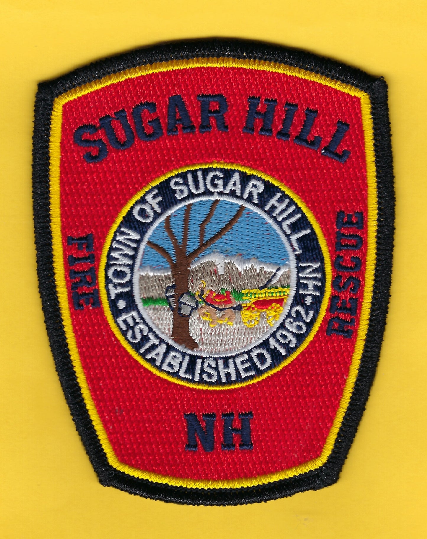 SUGAR HILL, NEW HAMPSHIRE FIRE-RESCUE DEPARTMENT EMBROIDERED PATCH DESIGNED AND PRODUCED BY PUBLIC SAFETY COLLECTIBLES.