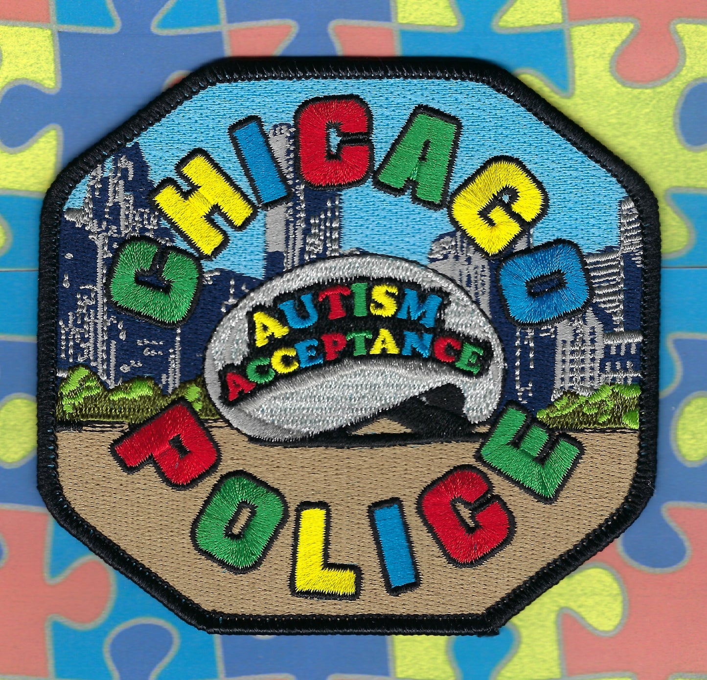 CHICAGO, ILLINOIS POLICE DEPARTMENT 'AUTISM ACCEPTANCE' EMBROIDERED PATCH DESIGNED AND PRODUCED BY GHOST PATCH ENTERPRISES.