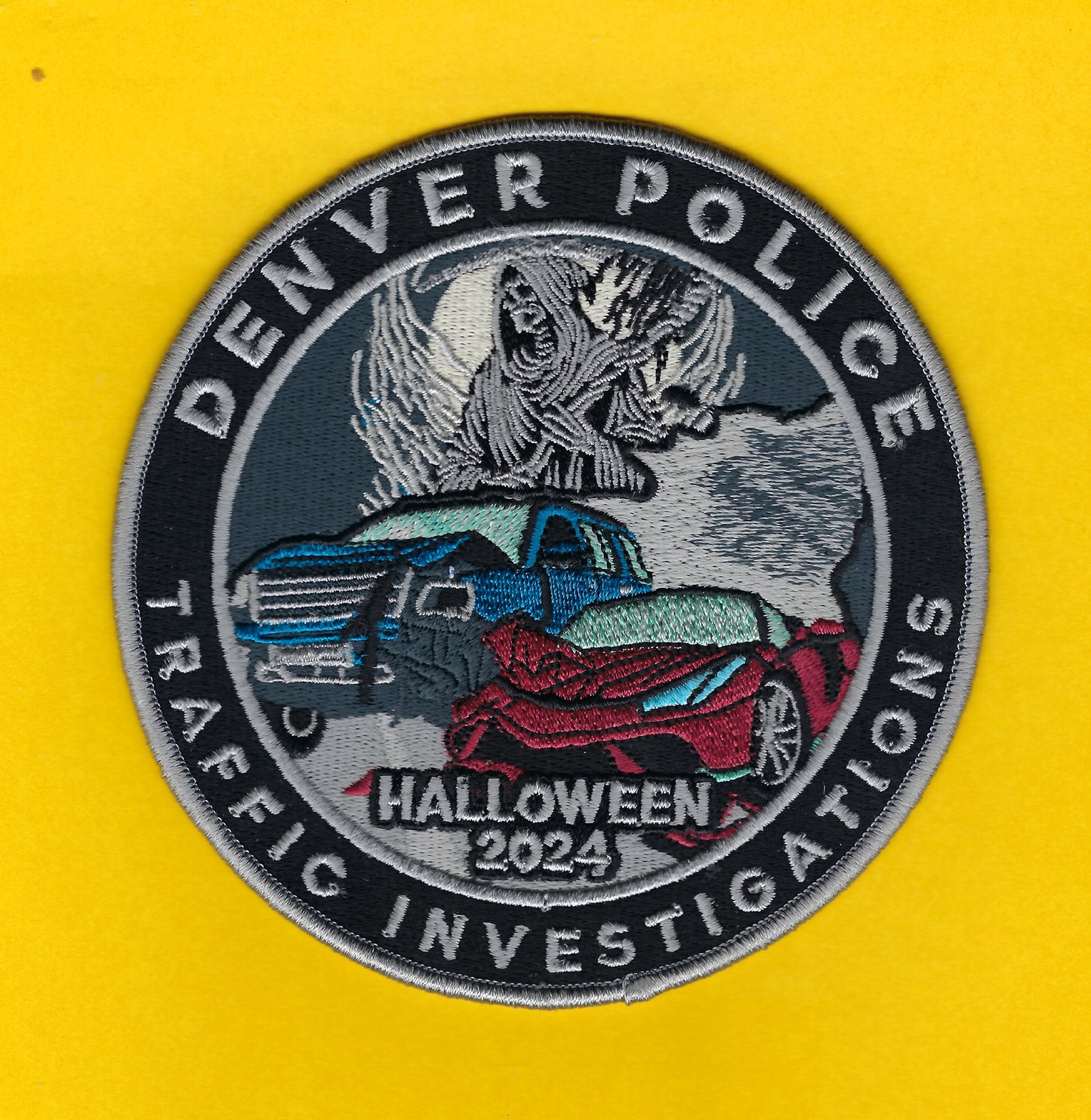 DENVER, COLORADO POLICE DEPARTMENT 'TRAFFIC INVESTIGATIONS UNIT' EMBROIDERED HALLOWEEN 2024 PATCH DESIGNED AND PRODUCED BY UNDERDOG PATCH DESIGNS.