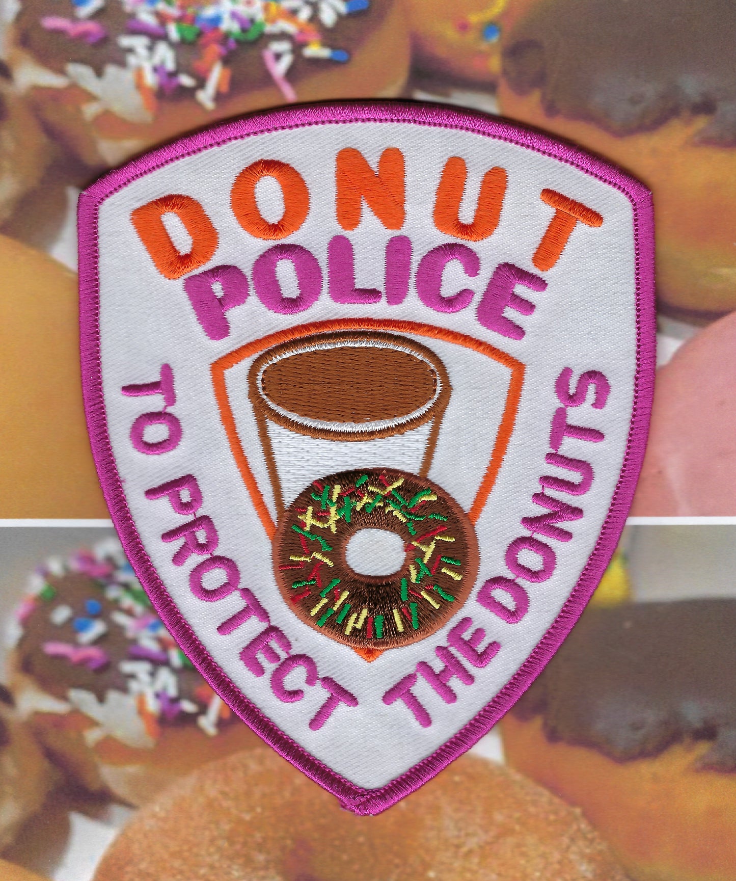 DONUT POLICE DEPARTMENT 'TO PROTECT THE DONUTS' EMBROIDERED NOVELTY PATCH A DESIGNED AND PRODUCED BY PUBLIC SAFETY COLLECTIBLES.
