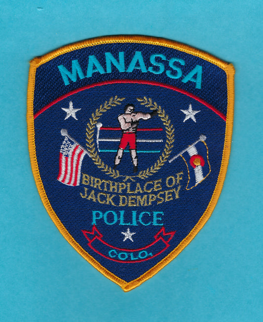MANASSA, COLORADO ( BIRTHPLACE OF JACK DEMPSEY ) POLICE DEPARTMENT 5-INCH EMBROIDERED PATCH BY PUBLIC SAFETY COLLECTIBLES.