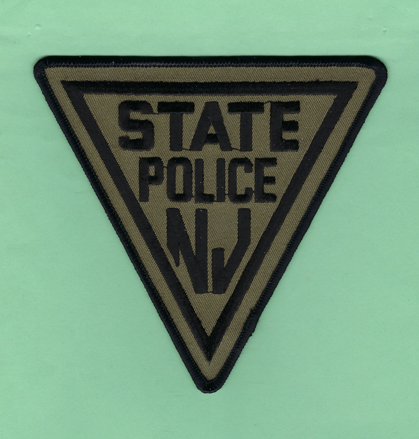 NEW JERSEY STATE POLICE (NJSP) DEPARTMENT 'SUBDUED BLACK & GREEN' EMBROIDERED PATCH BY PUBLIC SAFETY COLLECTIBLES.