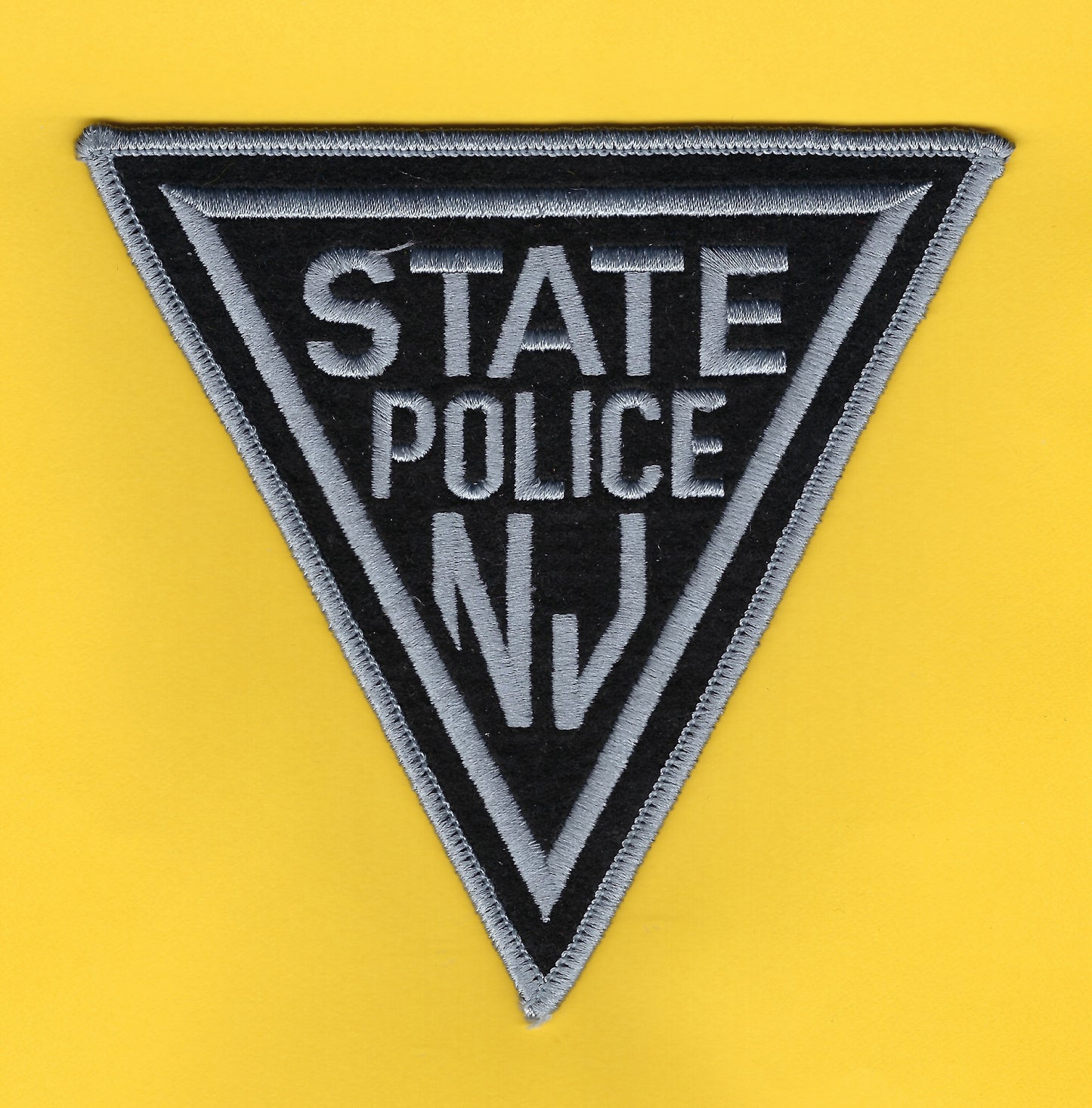 NEW JERSEY STATE POLICE (NJSP) DEPARTMENT 'SUBDUED BLACK SILVER' EMBROIDERED PATCH BY PUBLIC SAFETY COLLECTIBLES.