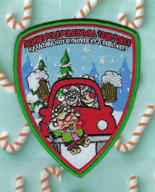 NORTH POLE, ALASKA POLICE DEPT 'DUI TASK FORCE' EMBROIDERED PATCH DESIHGNED AND PRODUCED BY UNDERDOG PATCH PRODUCTIONS.