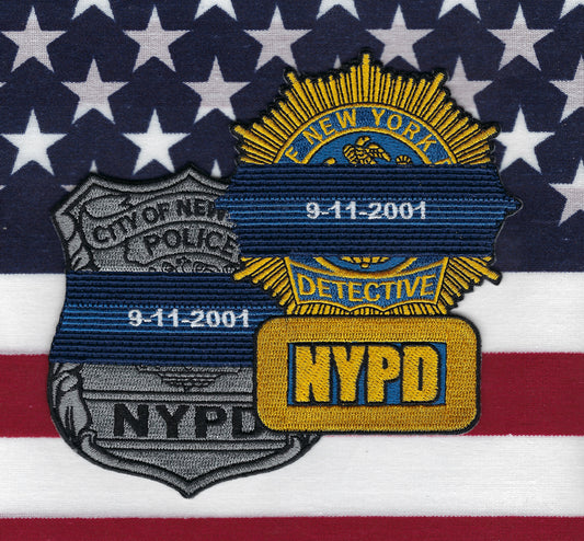NEW YORK CITY POLICE DEPARTMENT (NYPD) 9-11-01 COMMEMORATIVE EMBROIDERED PATCH FEATURING POLICE OFFICER AND DETECTIVE SHIELDS WITH MOURNING BANDS DESIGNED AND PRODUCED BY UNDERDOG PATCH DESIGNS.