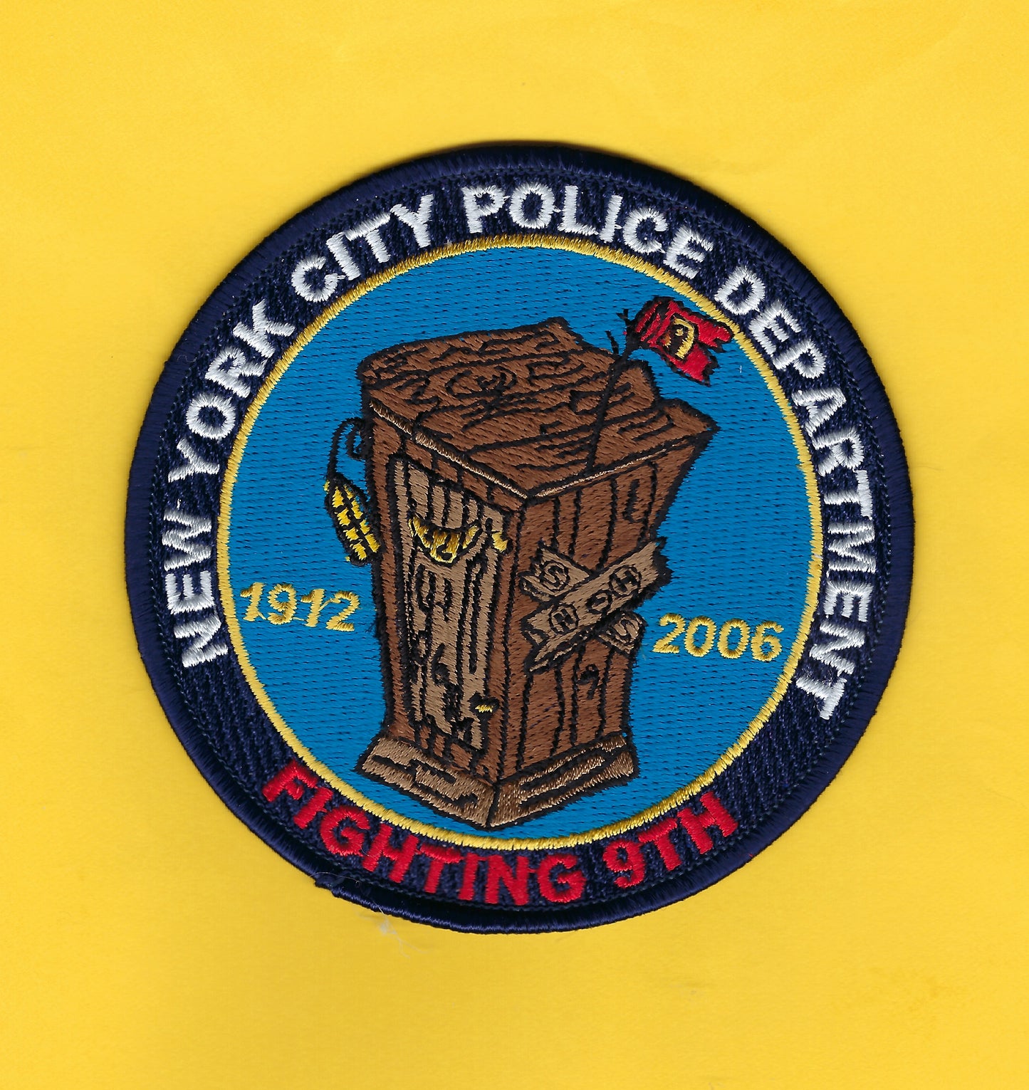 NEW YORK CITY POLICE DEPARTMENT (NYPD) 'NINTH PRECINCT' (FIGHTING 9TH) 4-INCH EMBROIDERED PATCH BY HUNTZMAN ENTERPRISES.