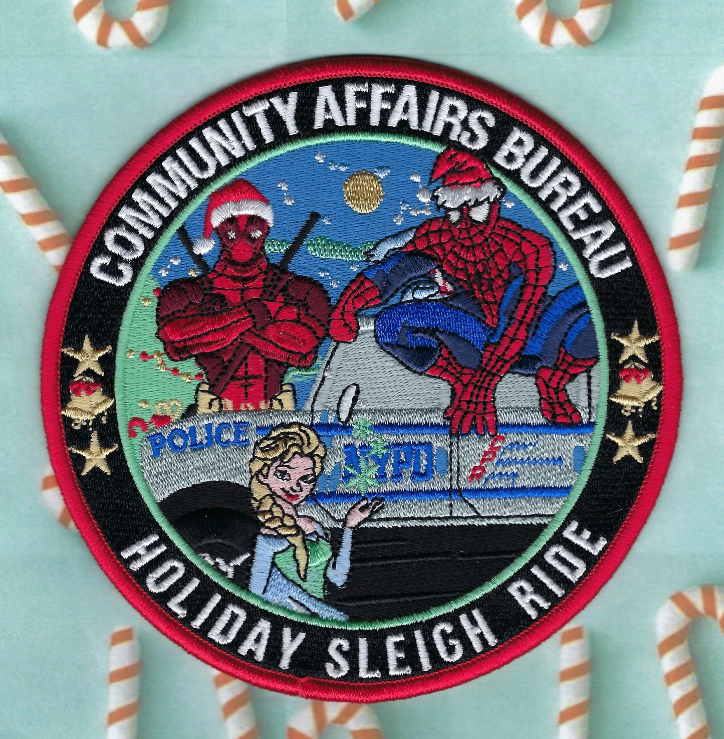 NEW YORK CITY POLICE DEPARTMENT (NYPD) COMMUNITY AFFAIRS BUREAU 'HOLIDAY SLEIGH RIDE' EMBROIDERED PATCH BY UNDERDOG PATCH DESIGNS.