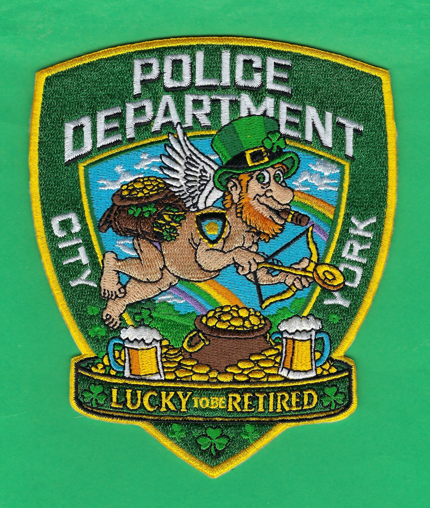 NEW YORK CITY POLICE DEPARTMENT (NYPD) 'LUCKY TO BE RETIRED' SAINT PATRICK's DAY EMBROIDERED PATCH BY UNDERDOG PATCH PRODUCTIONS.