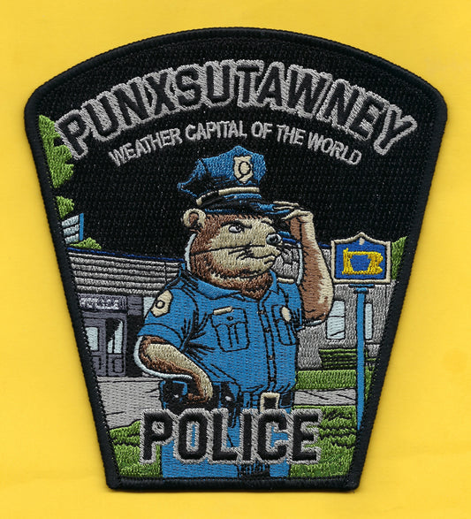 PUNXSUTAWNEY, PENNSYLVANIA POLICE DEPARTMENT 'WEATHER CAPITAL OF THE WORLD' EMBROIDERED PATCH DESIGNED AND PRODUCED BY GHOST PATCH ENTERPRISES.