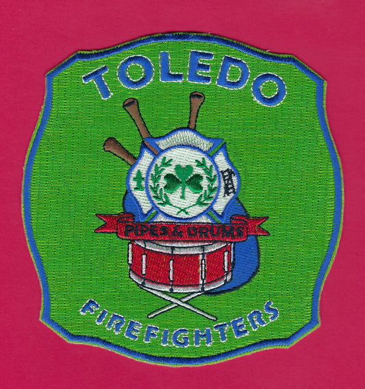 TOLEDO, OHIO FIREFIGHTERS PIPES AND DRUMS EMBROIDERED PATCH BY PUBLIC SAFETY COLLECTIBLES.