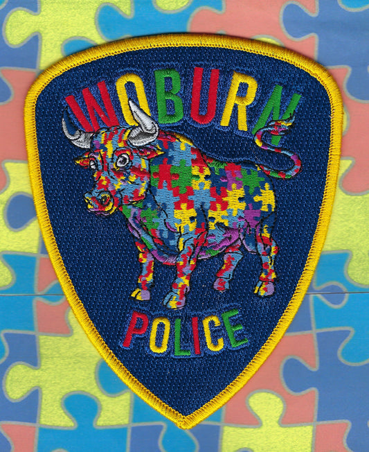 WOBURN, MASSACHUSETTS POLICE DEPARTMENT AUTISM AWARENESS EMBROIDERED PATCH DESIGNED AND PRDUVCED BY GHOST PATCH ENTERPRISES.